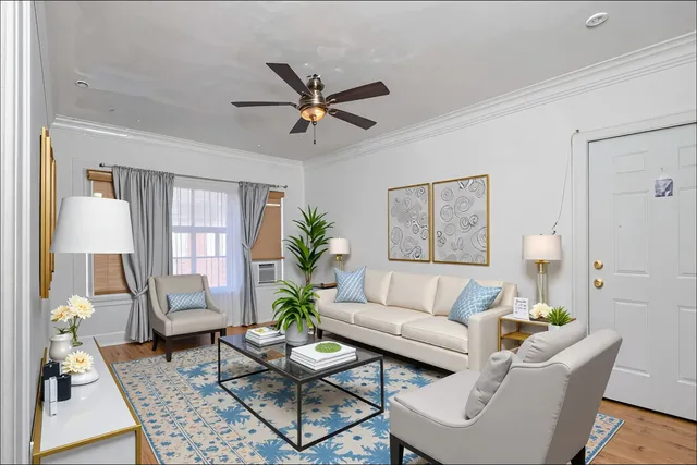 a living room with furniture and a window