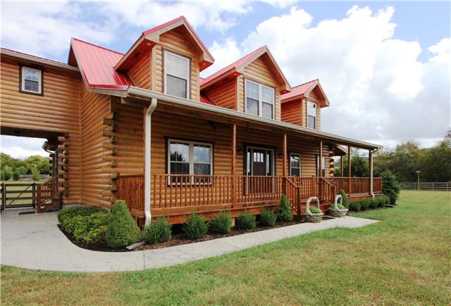 108 New Dawn Road Rockvale, TN 37153 - Photo 15 of 20 Front porch wraps around the side of the home and has fans to cool you on a warm evening.