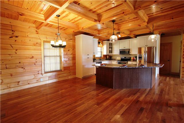 108 New Dawn Road Rockvale, TN 37153 - Photo 3 of 20 Eating area and kitchen...notice the attention to detail in the coffered ceiling, granite counters, beautiful cabinets and stainless appliances.