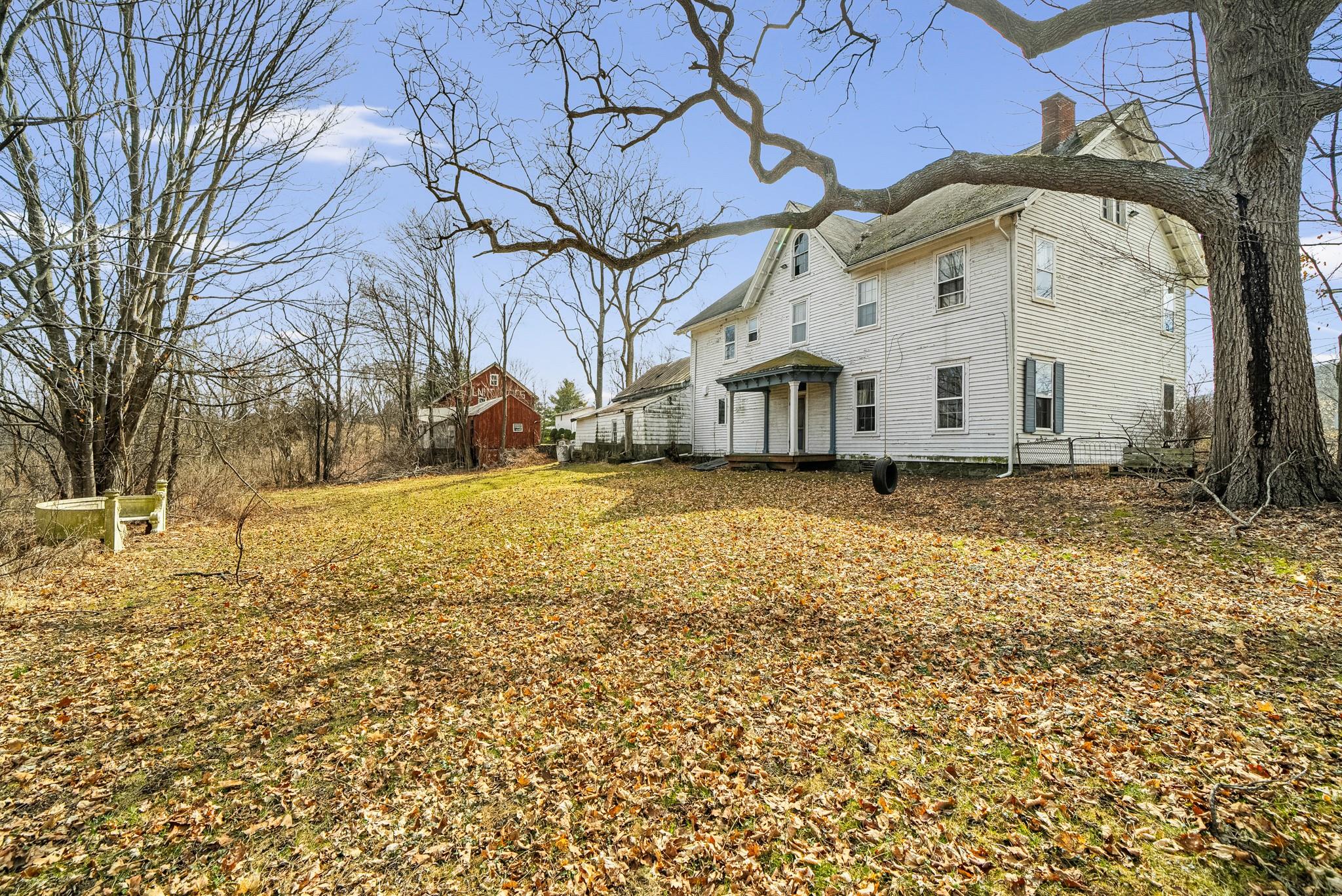 206 Greycourt Road, Unit 190 Chester, NY 10918 - Photo 14 of 49 a view of a white house with a yard