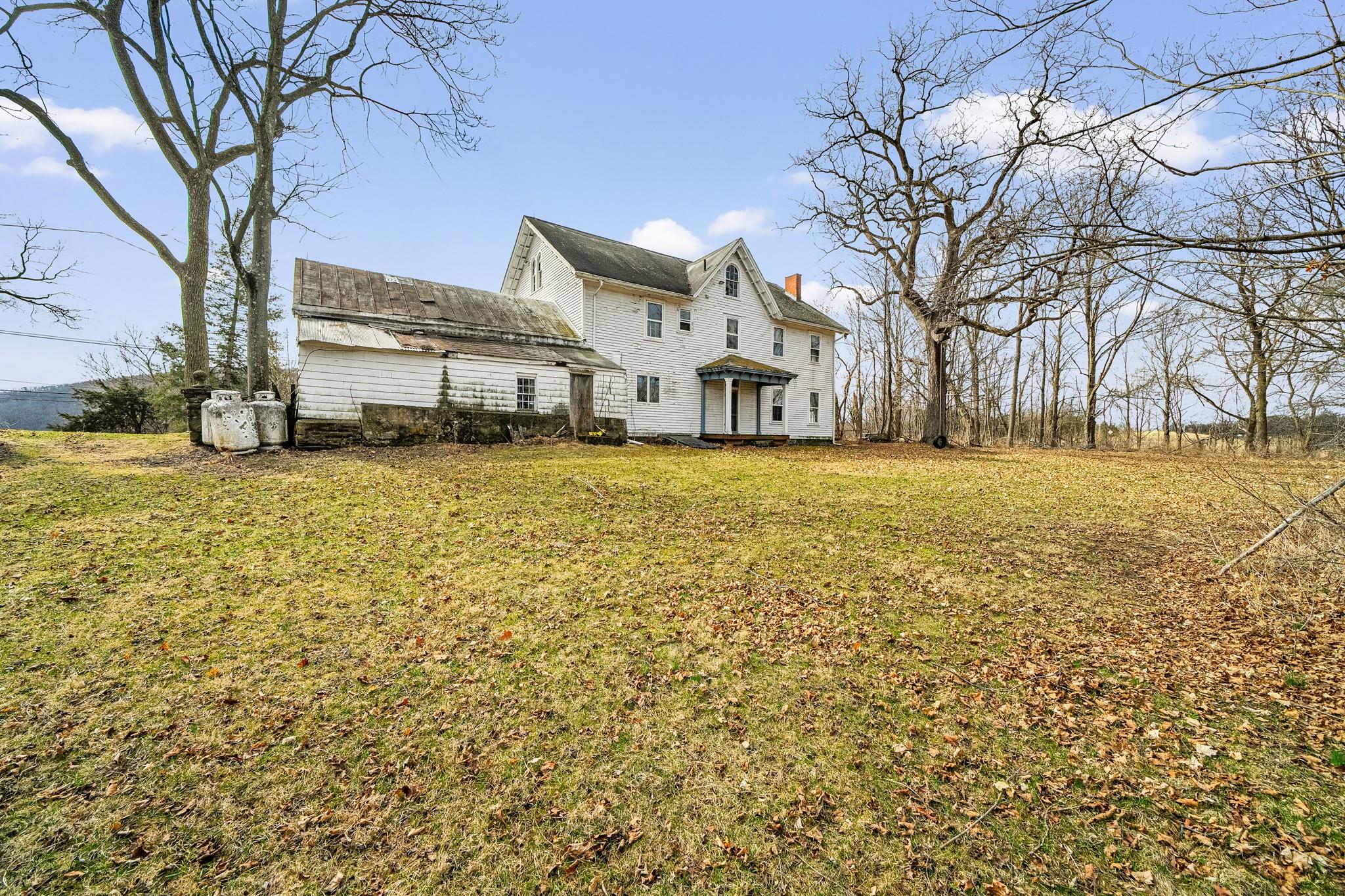 206 Greycourt Road, Unit 190 Chester, NY 10918 - Photo 16 of 49 a front view of a building with a yard