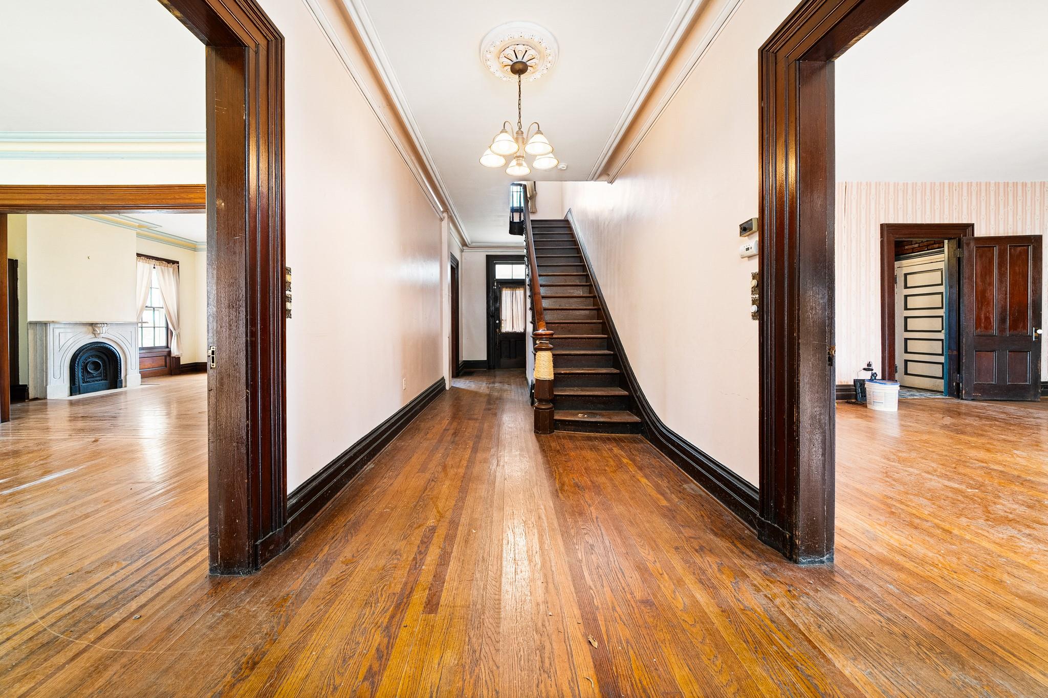 206 Greycourt Road, Unit 190 Chester, NY 10918 - Photo 17 of 49 a view of a hallway with wooden floor and staircase