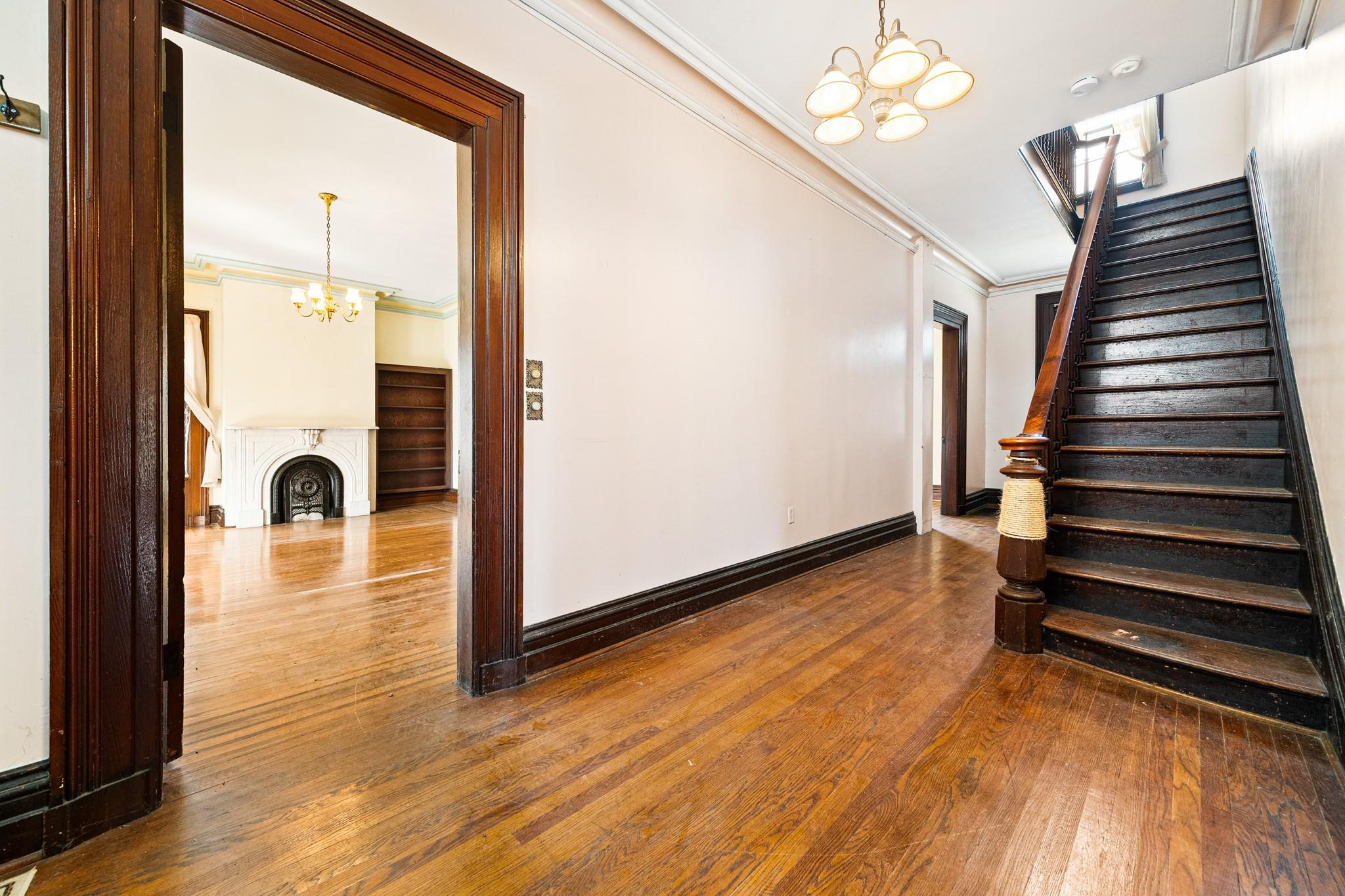 206 Greycourt Road, Unit 190 Chester, NY 10918 - Photo 18 of 49 a view of a hallway with wooden floor and staircase