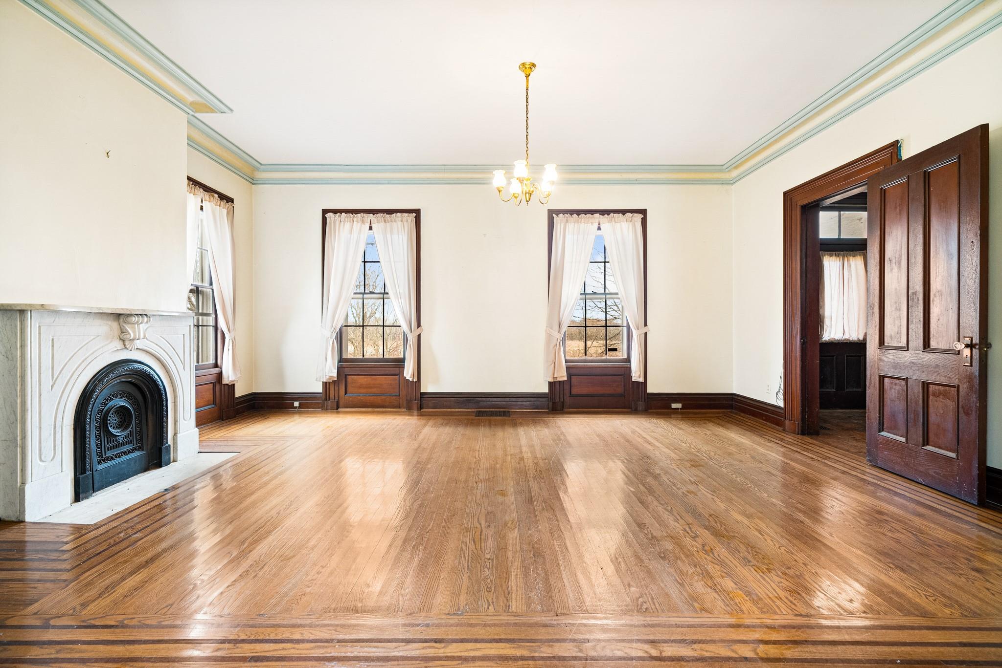 206 Greycourt Road, Unit 190 Chester, NY 10918 - Photo 27 of 49 a view of a livingroom with a fireplace window and wooden floor