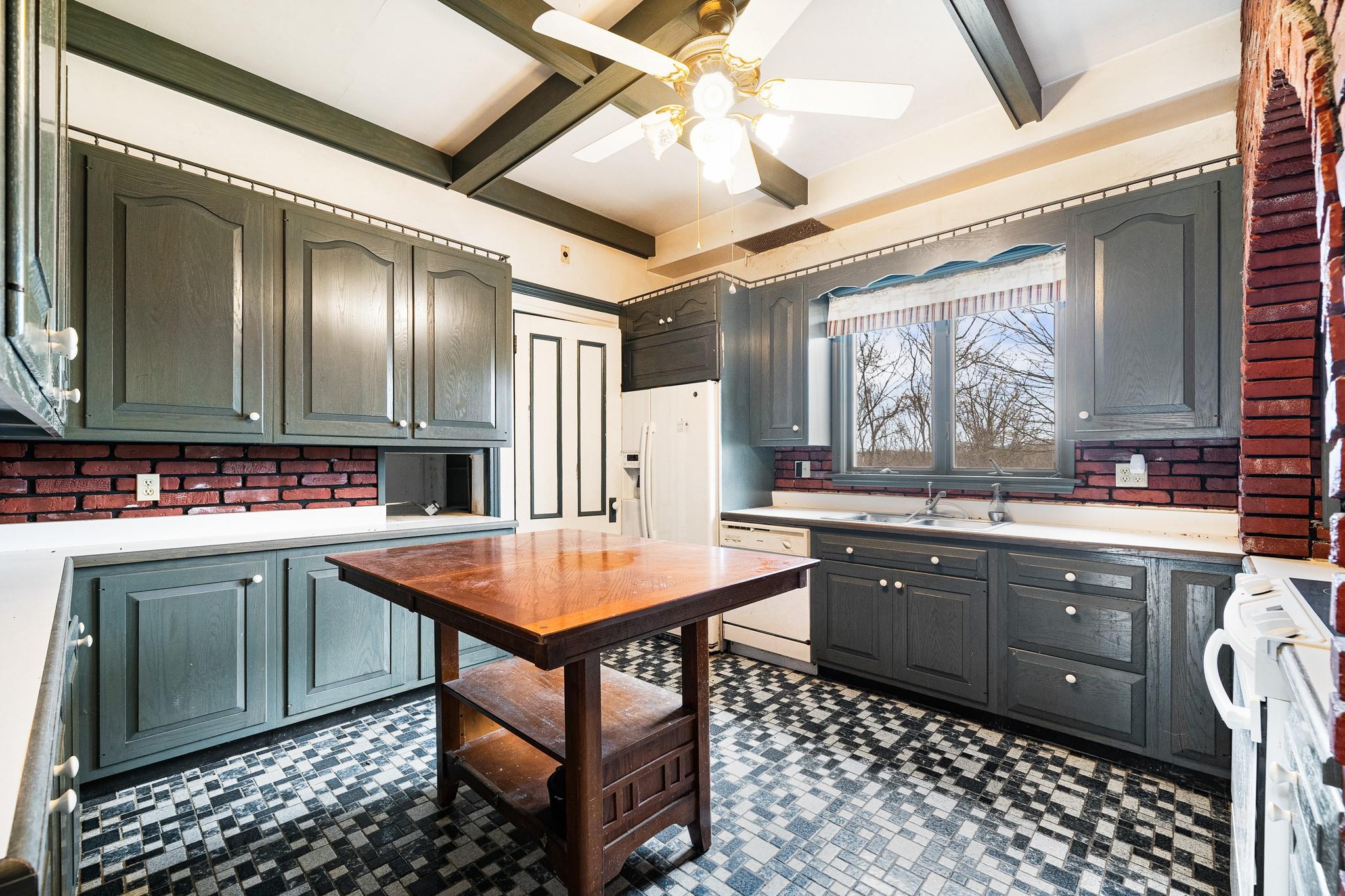 206 Greycourt Road, Unit 190 Chester, NY 10918 - Photo 34 of 49 a kitchen with stainless steel appliances granite countertop a sink a stove a refrigerator and wooden cabinets