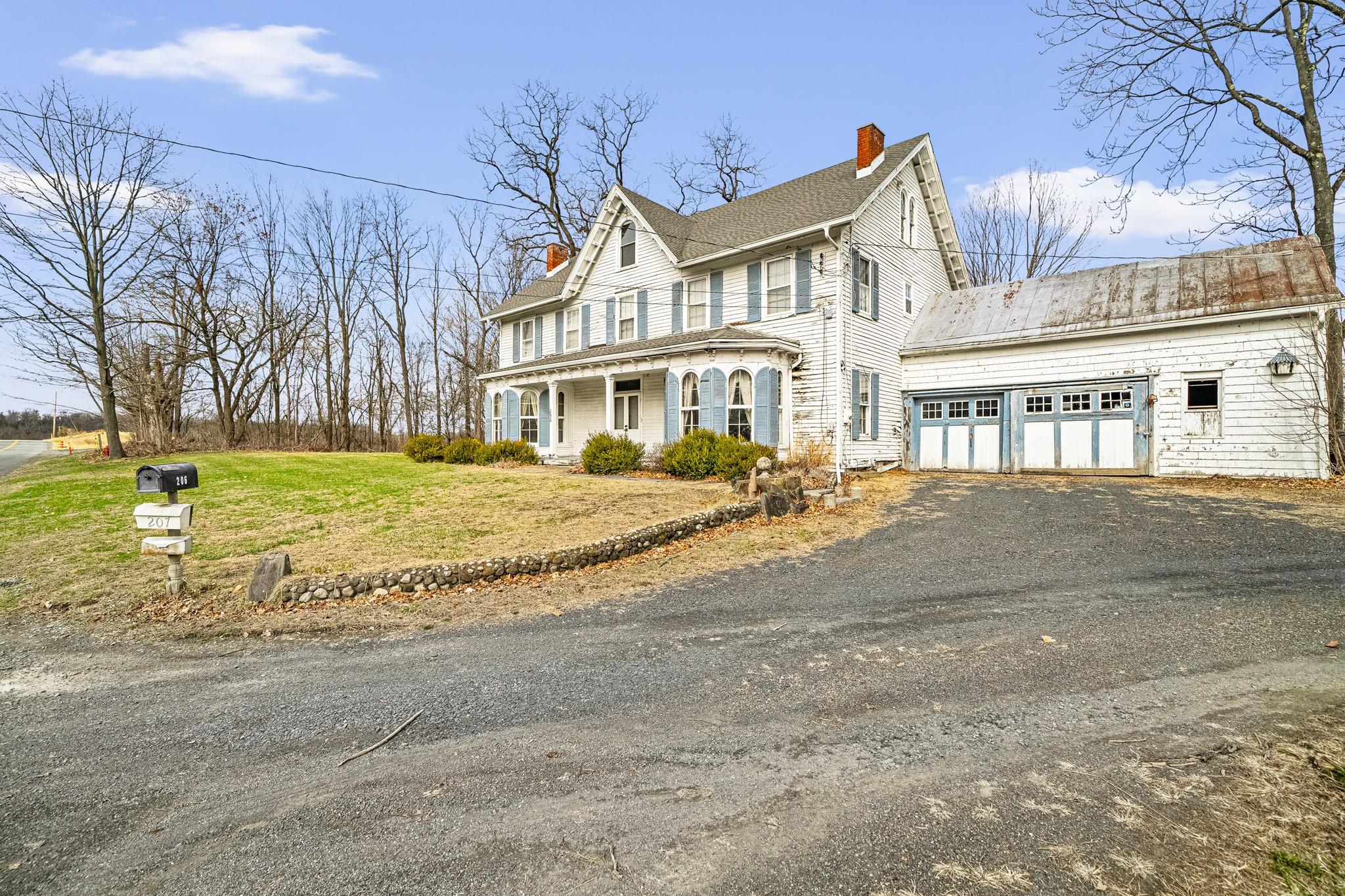 206 Greycourt Road, Unit 190 Chester, NY 10918 - Photo 10 of 49 a front view of a building with a yard