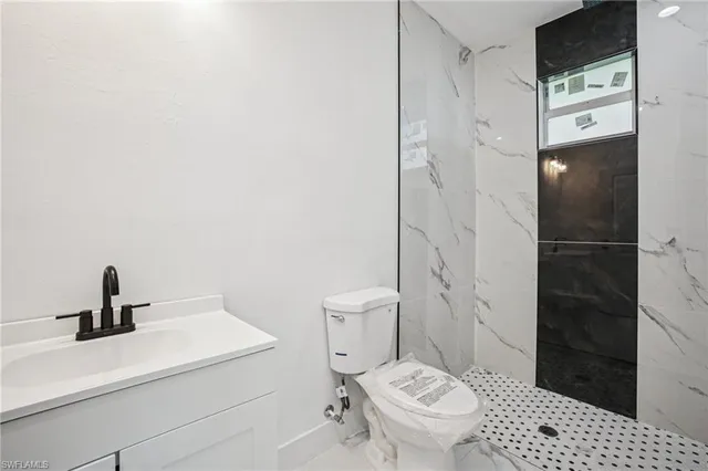 $335,000 | 524 Fairfax Avenue, Lehigh Acres, FL 33974