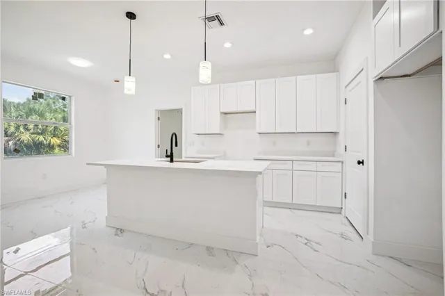 $335,000 | 524 Fairfax Avenue, Lehigh Acres, FL 33974