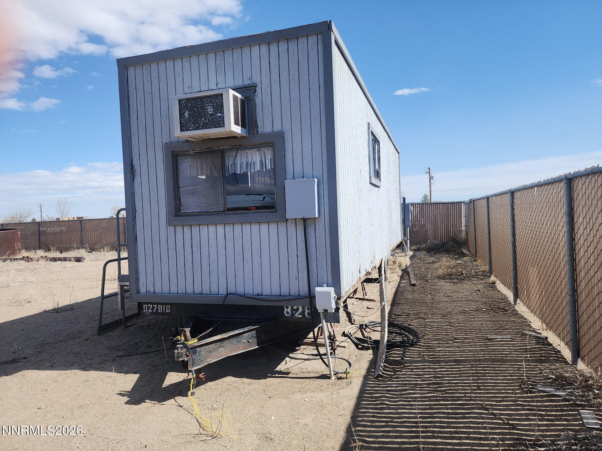 601 Windmill Drive Fallon, NV 89406 - Photo 10 of 18 a view of a backyard with sitting area