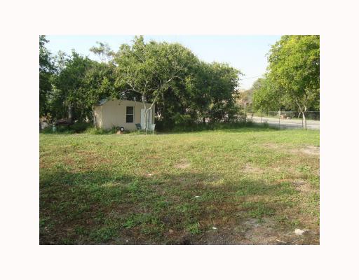 812 Lawrence Street Portland, TX 78374 - Photo 2 of 10 a open area with trees in the background
