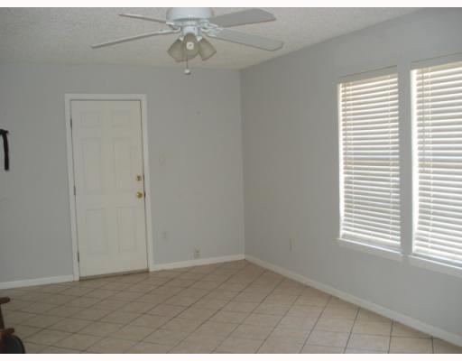 812 Lawrence Street Portland, TX 78374 - Photo 8 of 10 a view of an empty room with a window