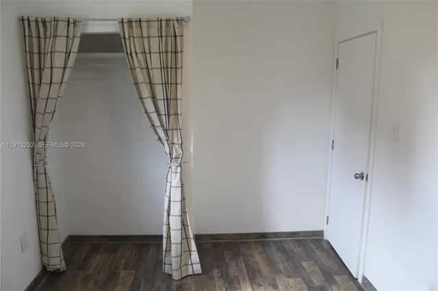 a view of entryway with wooden floor