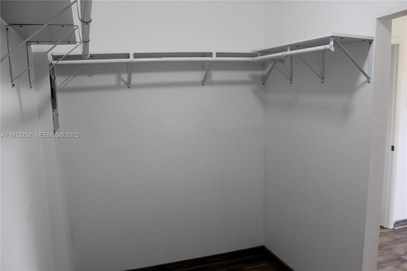 19879 Southwest 328th Street, Unit 2 Homestead, FL 33030 - Photo 16 of 20 a view of walk in closet