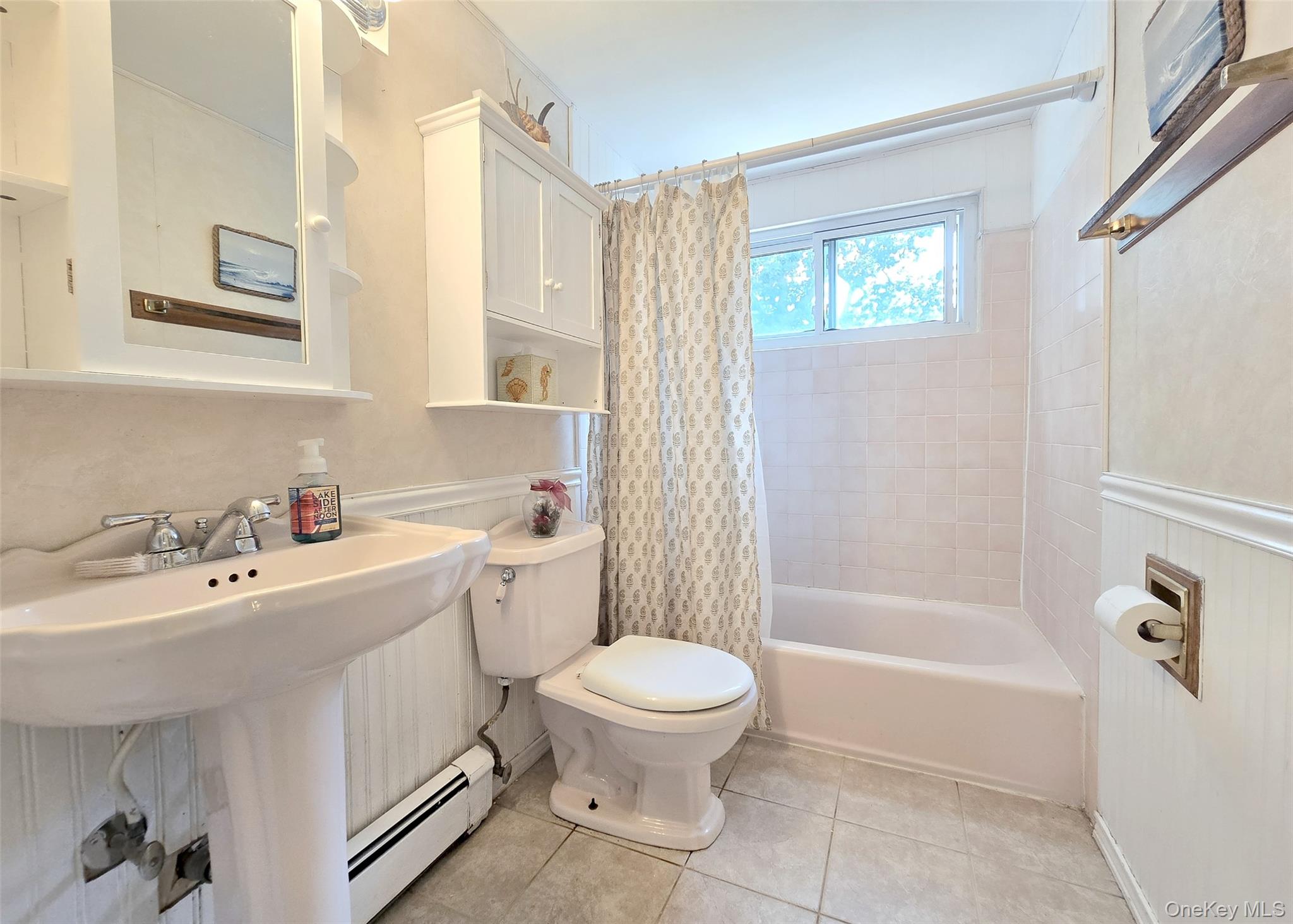 8 Corvette Road Selden, NY 11784 - Photo 11 of 21 a bathroom with a sink toilet and shower