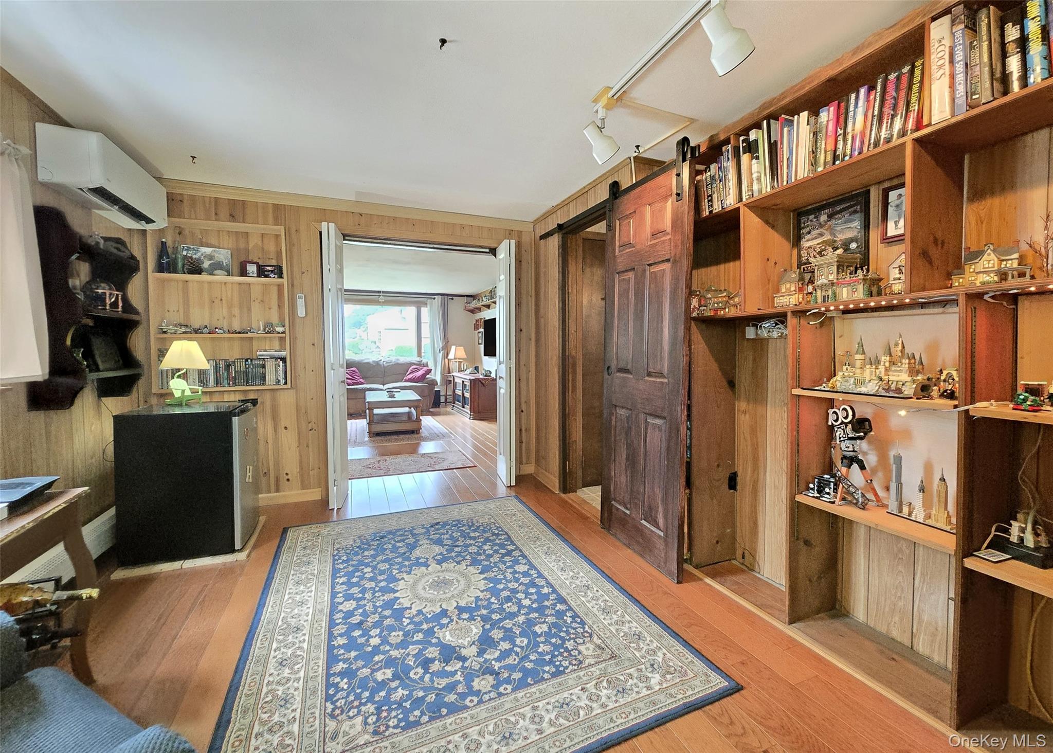 8 Corvette Road Selden, NY 11784 - Photo 9 of 21 a living room with lots of furniture and a rug