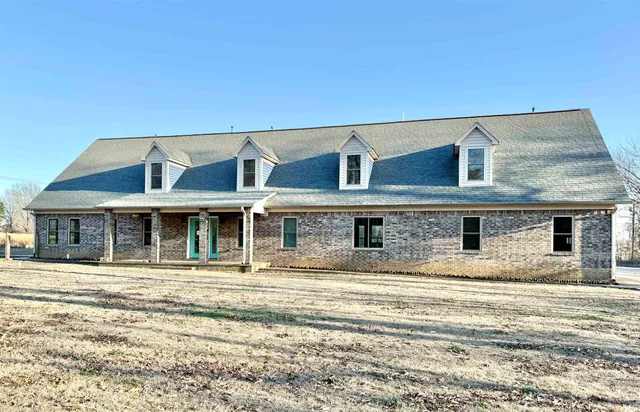 a front view of a house with a ocean view