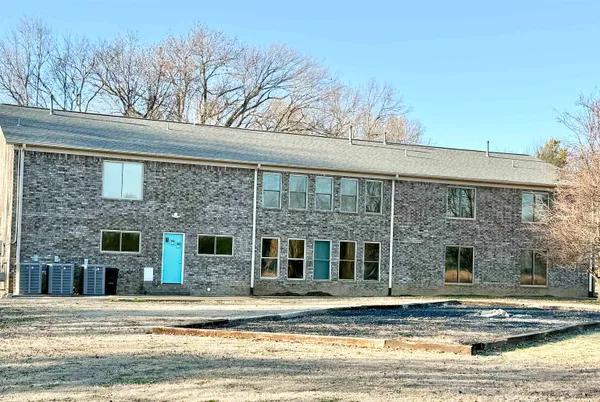 a view of a house with a swimming pool