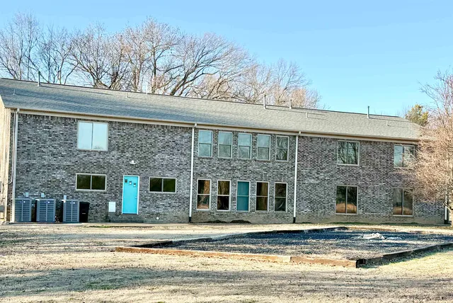 a view of a house with a swimming pool