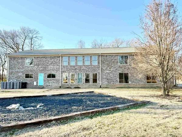a front view of a house with swimming pool