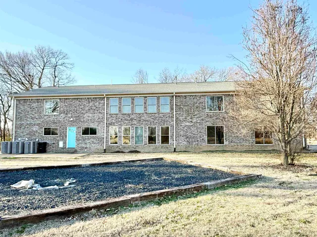 a front view of a house with swimming pool