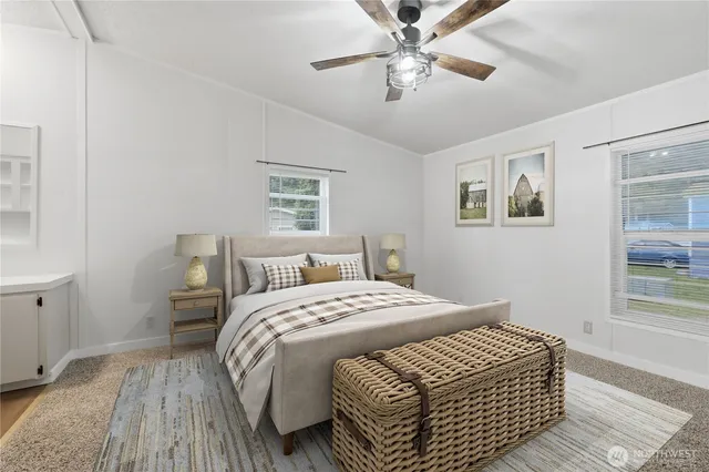 a view of empty room with a ceiling fan