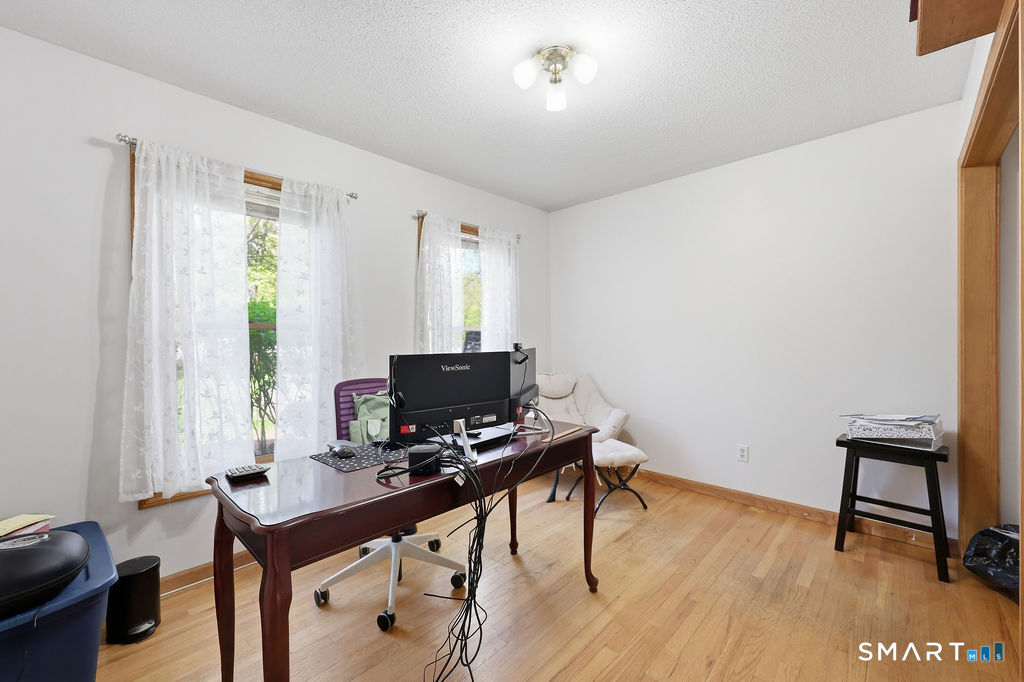 12 Forest Ridge Road Prospect, CT 06712 - Photo 11 of 40 a view of a workspace with furniture and a window