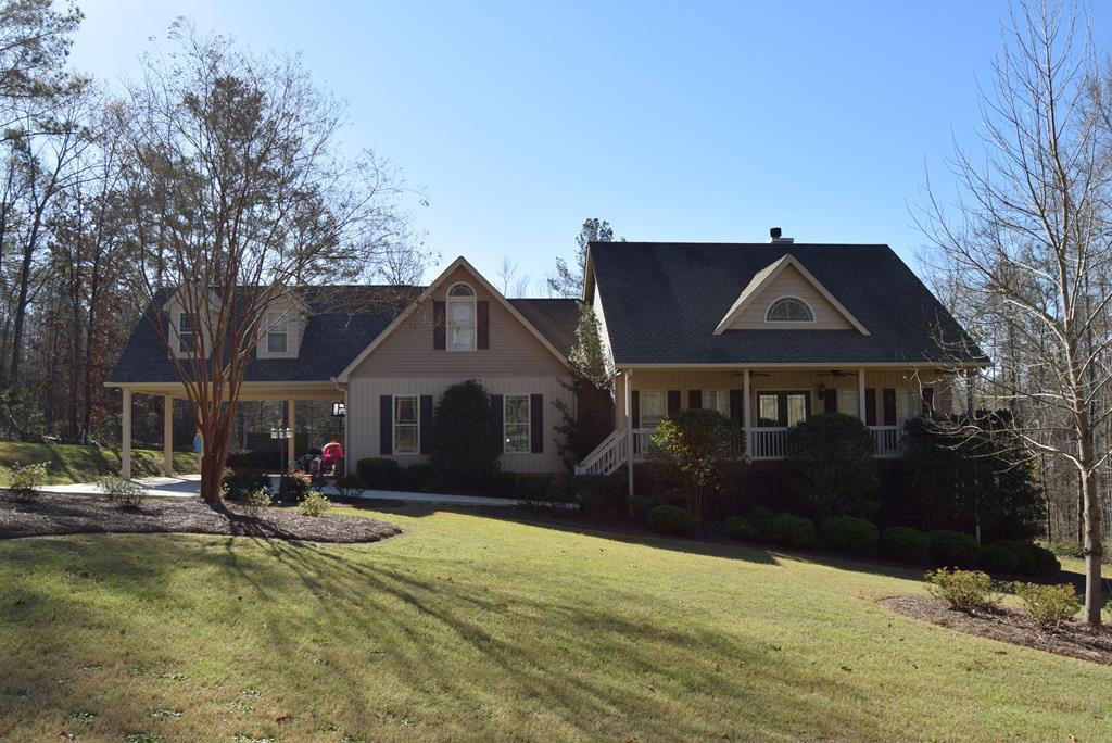 781 McKay Road Gray, GA 31032 - Photo 1 of 36 a front view of a house with a yard covered with snow
