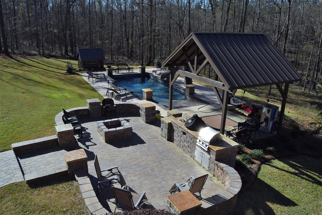 781 McKay Road Gray, GA 31032 - Photo 2 of 36 a view of a backyard with furniture and a garden