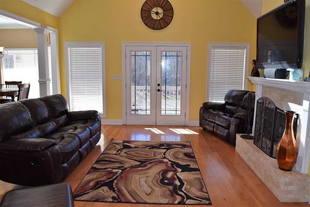 781 McKay Road Gray, GA 31032 - Photo 11 of 36 a living room with furniture and a flat screen tv