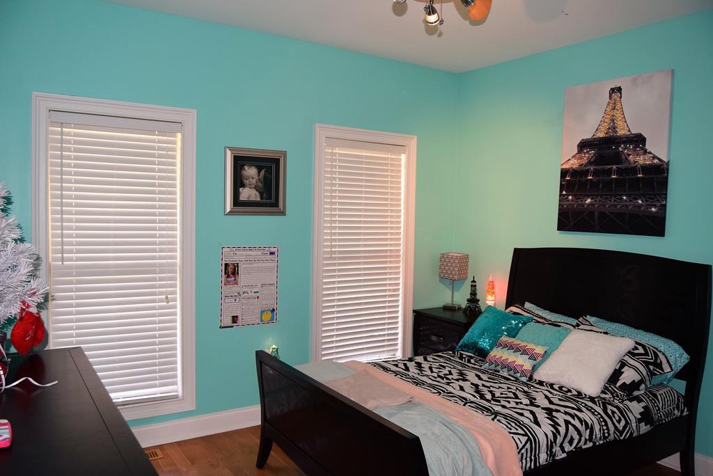 781 McKay Road Gray, GA 31032 - Photo 23 of 36 a bedroom with a bed and a window