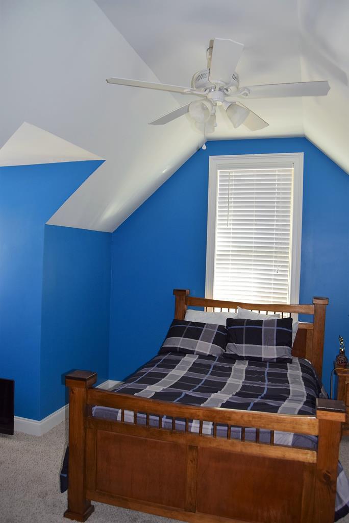 781 McKay Road Gray, GA 31032 - Photo 27 of 36 a bedroom with bed and window