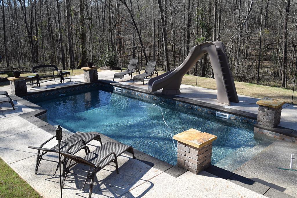 781 McKay Road Gray, GA 31032 - Photo 34 of 36 a view of a swimming pool with lounge chairs