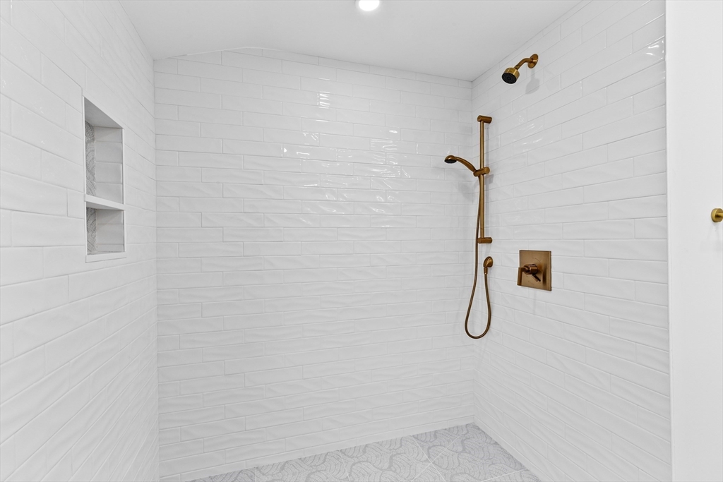 22 Clifford Court Hingham, MA 02043 - Photo 15 of 26 a bathroom with a shower