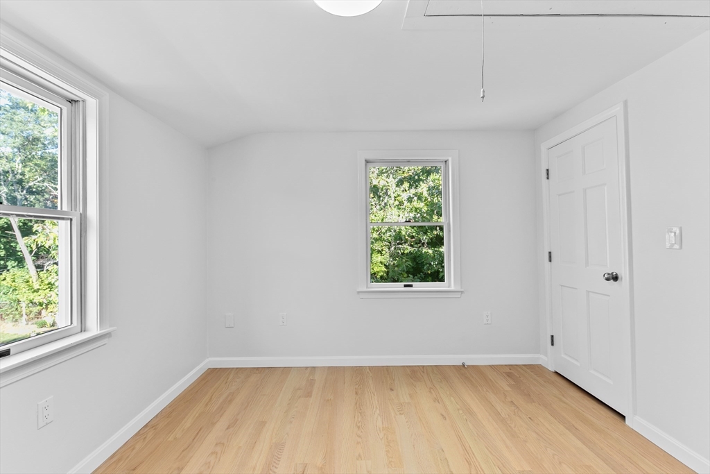 22 Clifford Court Hingham, MA 02043 - Photo 17 of 26 an empty room with a window