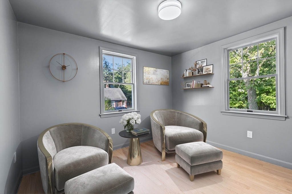 22 Clifford Court Hingham, MA 02043 - Photo 7 of 26 a living room with furniture and a window