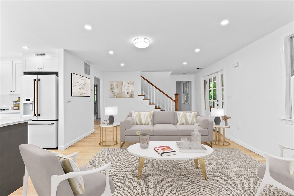 22 Clifford Court Hingham, MA 02043 - Photo 9 of 26 a living room with furniture and a table