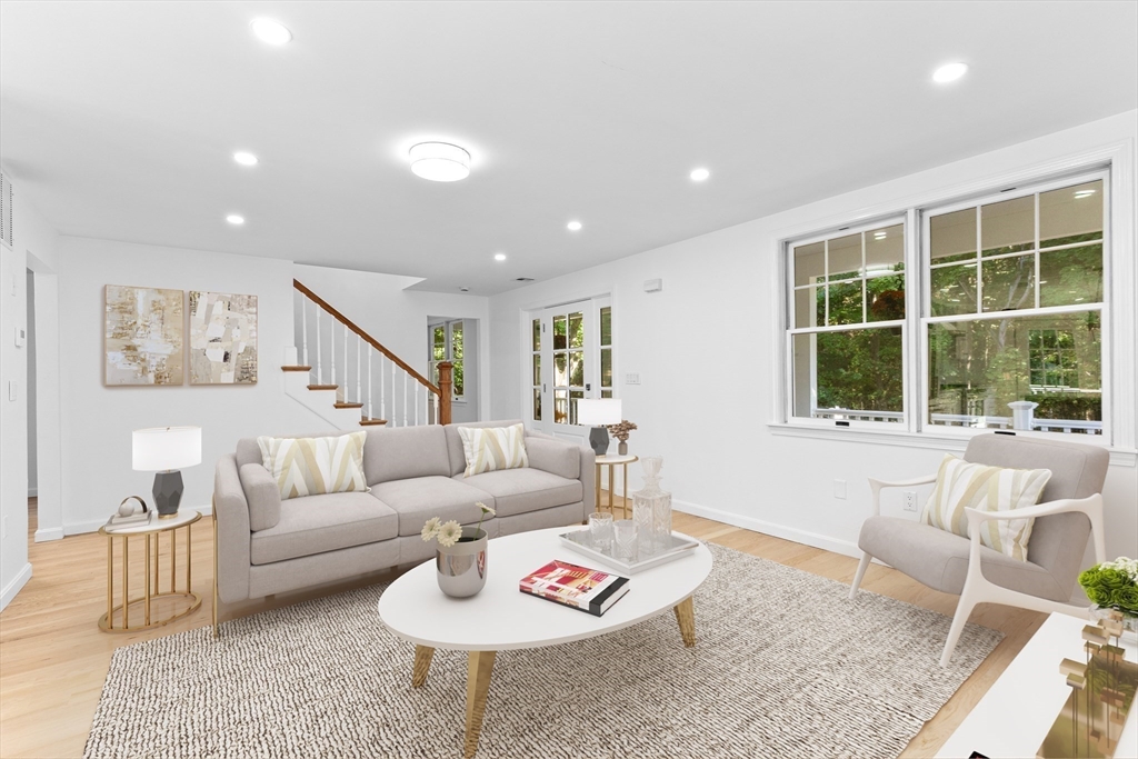 22 Clifford Court Hingham, MA 02043 - Photo 10 of 26 a living room with furniture and a large window