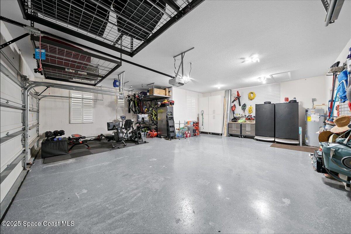 4357 Preservation Circle Melbourne, FL 32934 - Photo 37 of 56 a view of a room with gym equipment