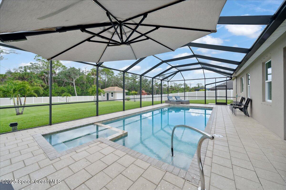 4357 Preservation Circle Melbourne, FL 32934 - Photo 5 of 56 a view of a backyard