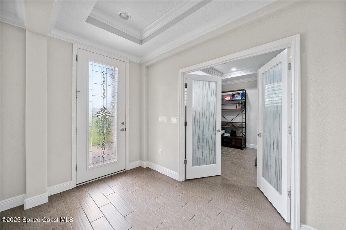 4357 Preservation Circle Melbourne, FL 32934 - Photo 9 of 56 a view of empty room with floor to ceiling window