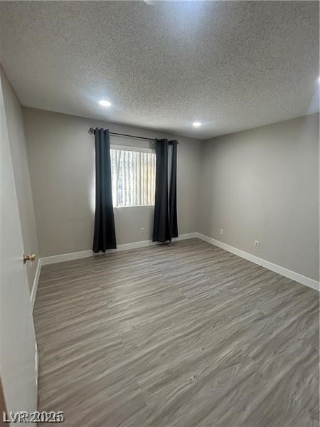 9070 Spring Mountain Road, Unit 210 Las Vegas, NV 89117 - Photo 6 of 12 This inviting room features resilient vinyl flooring, creating a comfortable and practical living space.