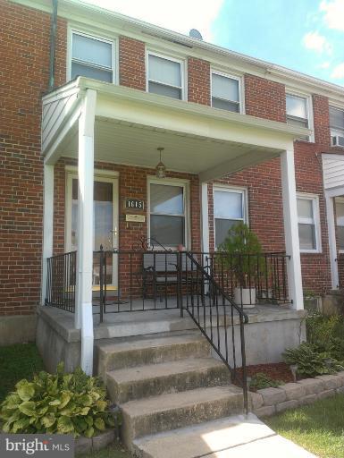 1615 Ramblewood Road Baltimore, MD 21239 - Photo 1 of 19 a front view of a house