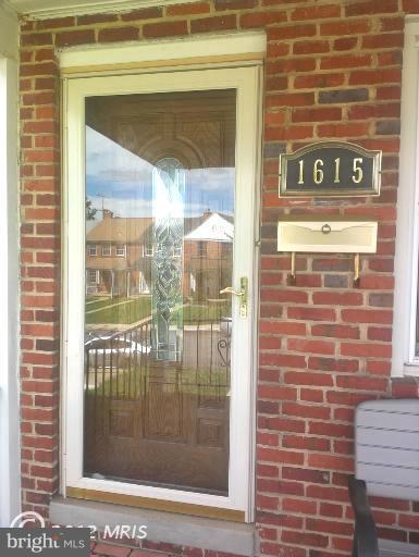 1615 Ramblewood Road Baltimore, MD 21239 - Photo 2 of 19 a view of a door of a building