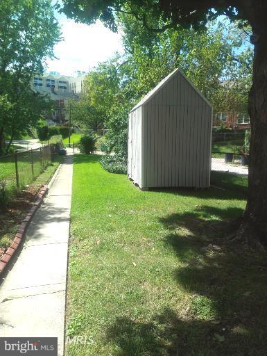 1615 Ramblewood Road Baltimore, MD 21239 - Photo 18 of 19 a view of backyard with green space