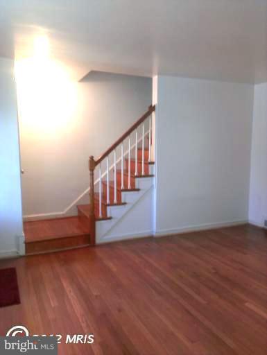 1615 Ramblewood Road Baltimore, MD 21239 - Photo 8 of 19 a view of entryway with wooden floor