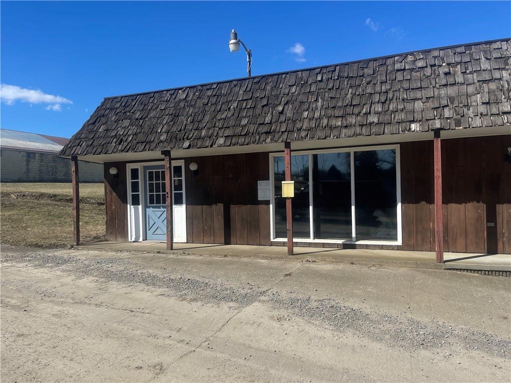 a front view of a building with glass windows