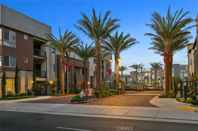 a view of a street with a building in the background