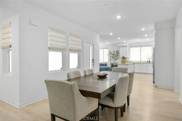 a bedroom with a bed and a chair