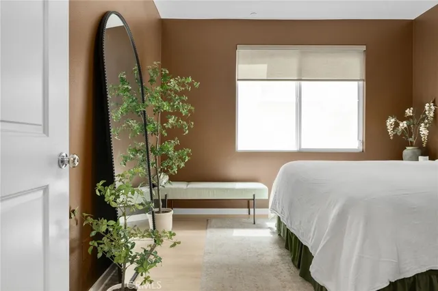 a bathroom with a shower sink and mirror
