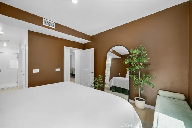 a bathroom with a shower and a sink